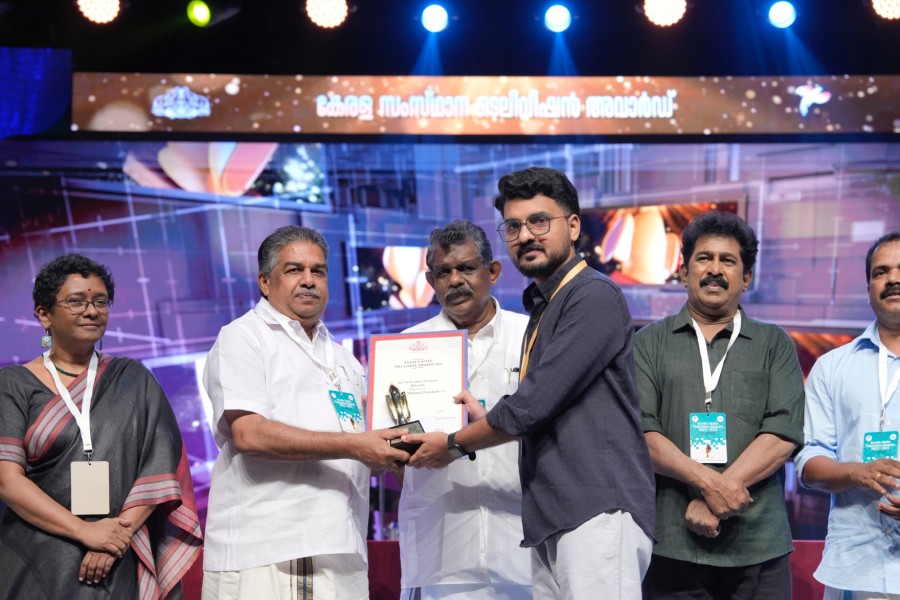 Writer & Director Mithun Chandan receiving Award